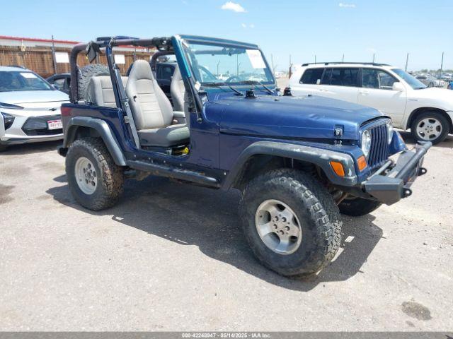  Salvage Jeep Wrangler