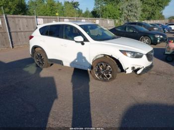  Salvage Mazda Cx